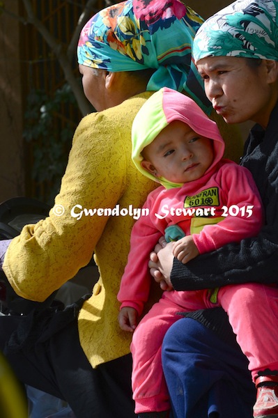 Riding on a Motorcycle, Xinjiang, China, Photographed by Gwendolyn Stewart, c. 2015; All Rights Reserved